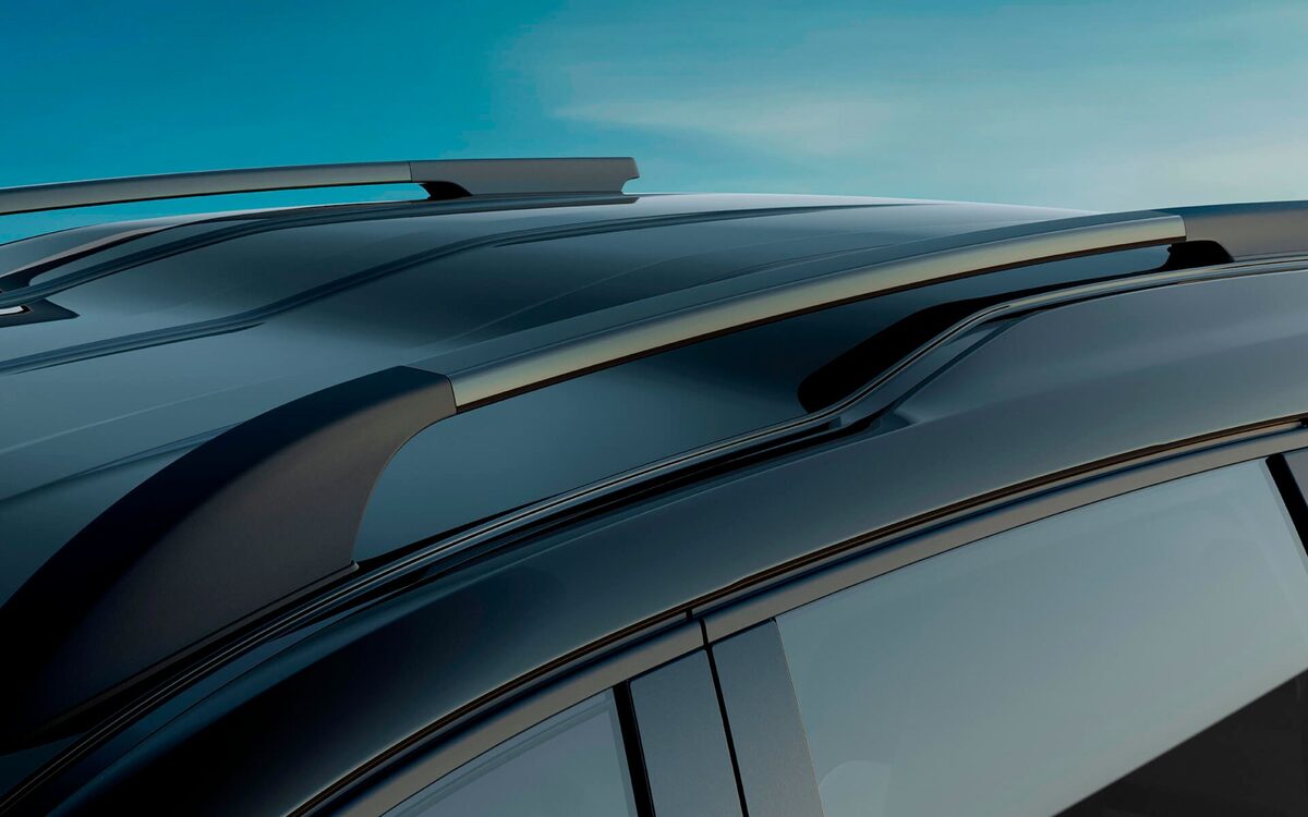 Close-up of the Triber black roof rails and roof against a blue sky