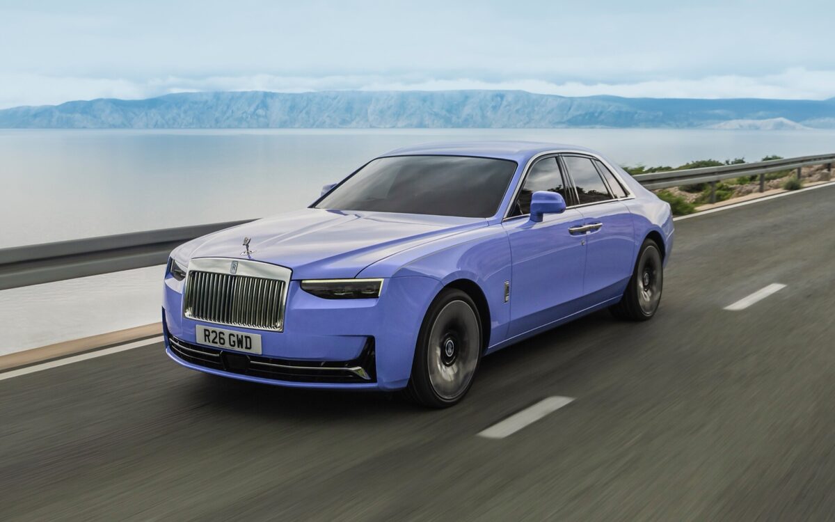 Rolls-Royce Ghost in lilac driving along a coastal road