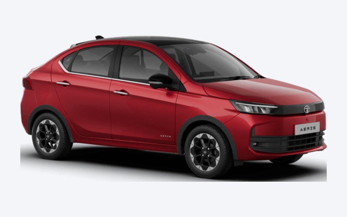 Tata Aeris sedan in Nitro Crimson red, seen from the front side