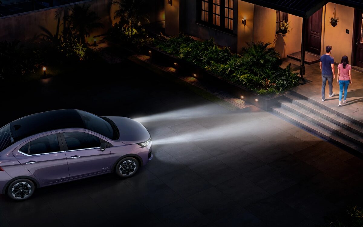 Tata Aeris at night with its follow-me-home headlamps lighting the path to the door