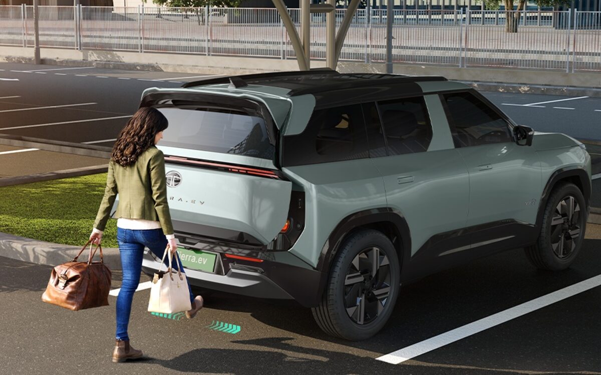 Tata Sierra.ev tailgate opening by gesture as the owner loads shopping