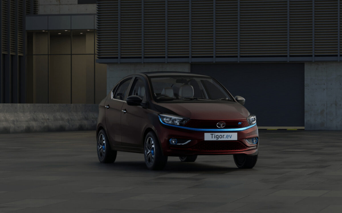 Tata Tigor.ev parked by a building in the city