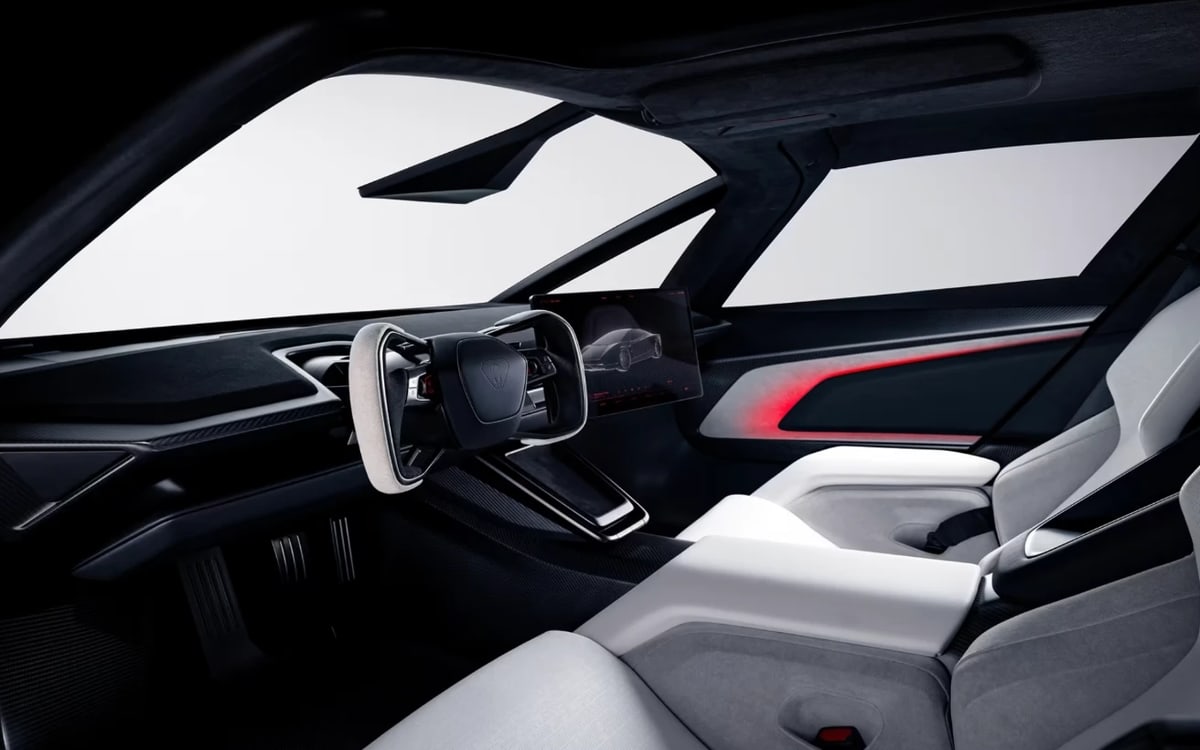 Tesla Roadster cabin with a yoke steering wheel, a floating screen and white seats